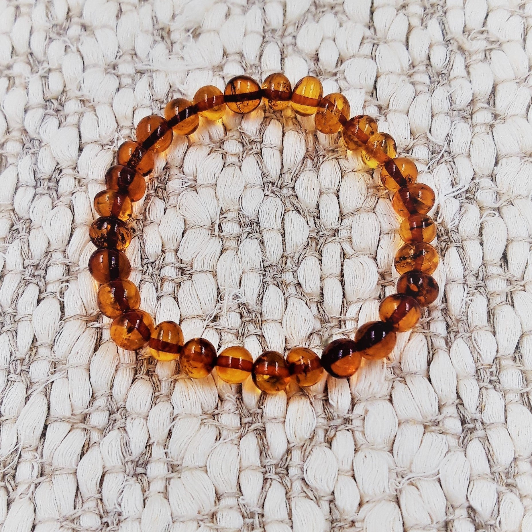 Amber Bracelets Made of Large Oval Shape Baltic Amber Beads.